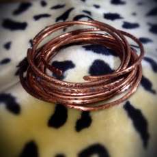 Hammered copper and bronze bangles