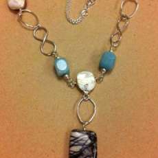 Freeform silver and shells