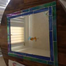 Custom one of a kind Stained glass mirrors of all sizes and prices