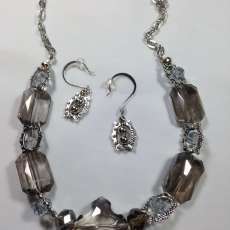 silver/gray crystal necklace with matching earrings