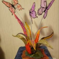 3d art sculpture Abstract Flower with butterflies on a stone and wood stand