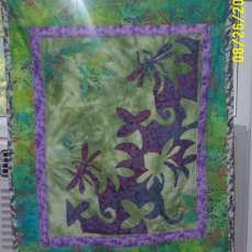Quilted dragonfly wall hanging -green and purples-