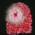 Fuzzy pink hat with handmade flower