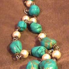 Turquoise and vintage pearls on copper