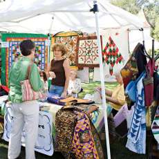 A Quilting Booth at the Awesome Art in Autumn Gardens Arts & Crafts Festival