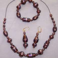 BROWN GLASS BEAD SET.