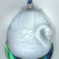 hand carved white fiiber optic swan w/ paua