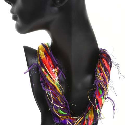 This twisted Fiber Necklace is made with wool,ribbon,flag yarn and 3 other interesting novelty yarns