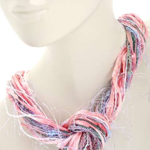 Pink ribbon, Purple yarn & Silver metallic yarn are the highlighted colors in this knotted Fiber Necklace