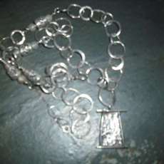 sterling silver necklace with ritculated silver center