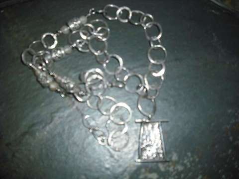 sterling silver necklace with ritculated silver center
