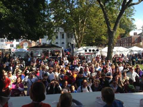 Picture from stage looking into crowd during apple fritter eating contest