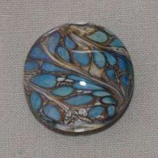 Turquoise feathers on Ivory