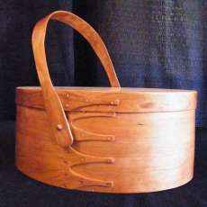 Shaker Swing-Handle Carrier in Natural Cherry.