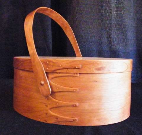 Shaker Swing-Handle Carrier in Natural Cherry.