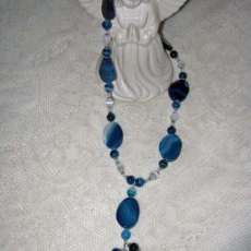 Blue Agate and Sterling Silver with White cat's eye beads.