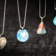  Hand crafted pendants with silver chains