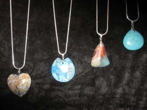  Hand crafted pendants with silver chains