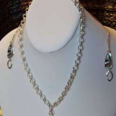 Sterling silver necklace with bead slider and ornate toggle clasp, Swarovski pearls