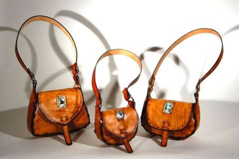 Small shoulder bags with cut stones