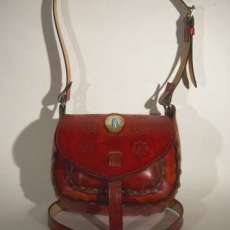 Red leather with matching belt and pendant...sterling and larimar