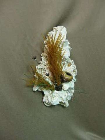 SILK AND NATURAL MATERIALS IN A STONE WALL HANGING