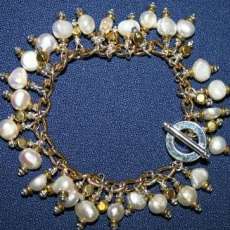 Silver and Gold Charm Bracelet