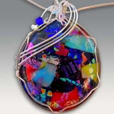 Sterling silver wire wrapped dichroic glass pendant