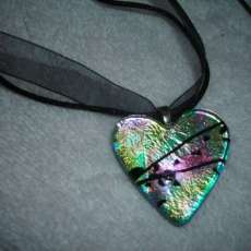 Hand cut heart pendant