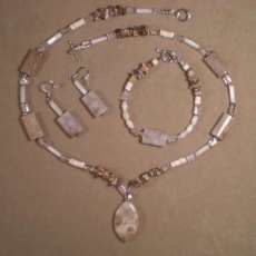 Fossilized Coral Jasper Stone Pendant Necklace Set.