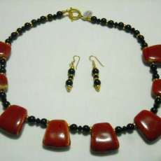 RED PORCLEIN TRIANGLES.PEWTER & LAVA SPACERS