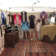 Booth photo of silk scarves I hand design