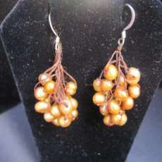 Copper Fresh water pearls made from waxed hemp and pearls has a matching necklace