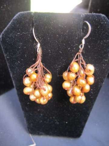 Copper Fresh water pearls made from waxed hemp and pearls has a matching necklace