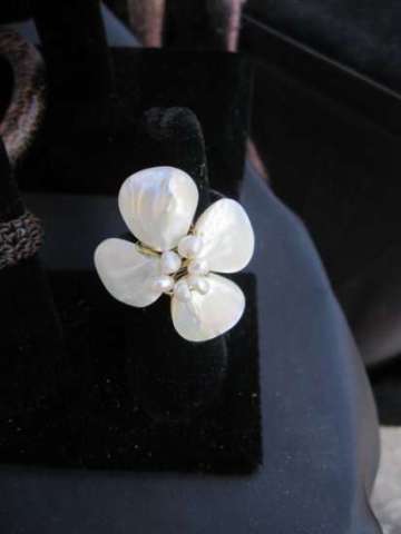 White coral ring with waxed hemp macromay ring design