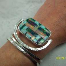 Reversible Braclet Kyocera opal on one side and rainbow calsilica