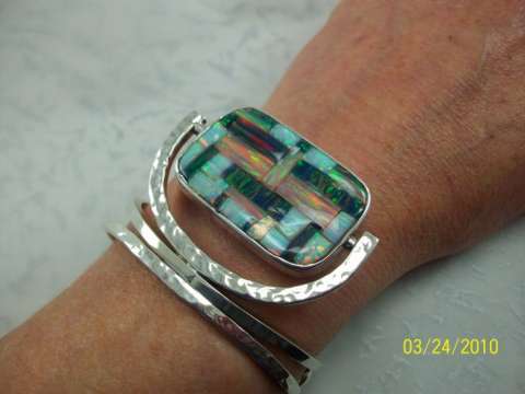 Reversible Braclet Kyocera opal on one side and rainbow calsilica