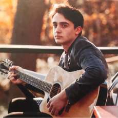 Singing- Guitarist - Taylor Thomas Lane