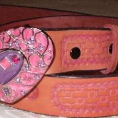 Beautiful pink-stained leather belt, cut to size
