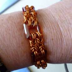 Copper chainmaille bracelet with amber Swarovski squares