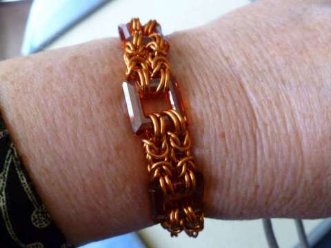 Copper chainmaille bracelet with amber Swarovski squares