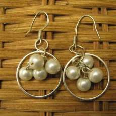 Delicate pearl beads in silver rings earrings
