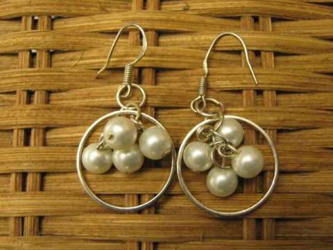 Delicate pearl beads in silver rings earrings