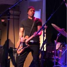 Nick Young - Guitar/Vocals