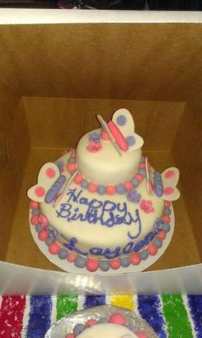 All fondant cake with pink and lavender swirl on the inside