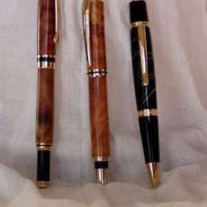 Burl and acrylic pens