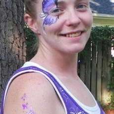 Painted butterfly eye & glitter tattoos