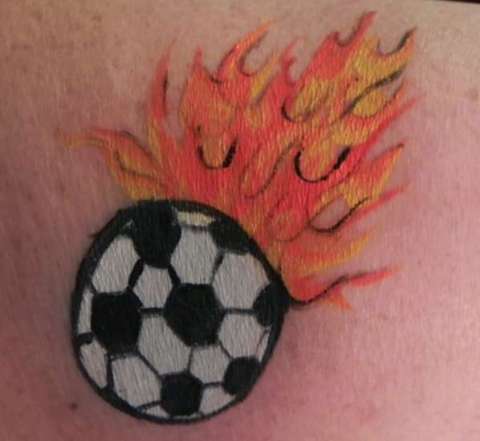 Flaming soccer ball