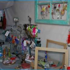 Necklaces with little bottles of infused h2o or fluers