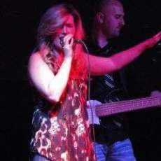 Lisa wowing the crowd at a Jeff Bates Concert in Raliegh Ms.